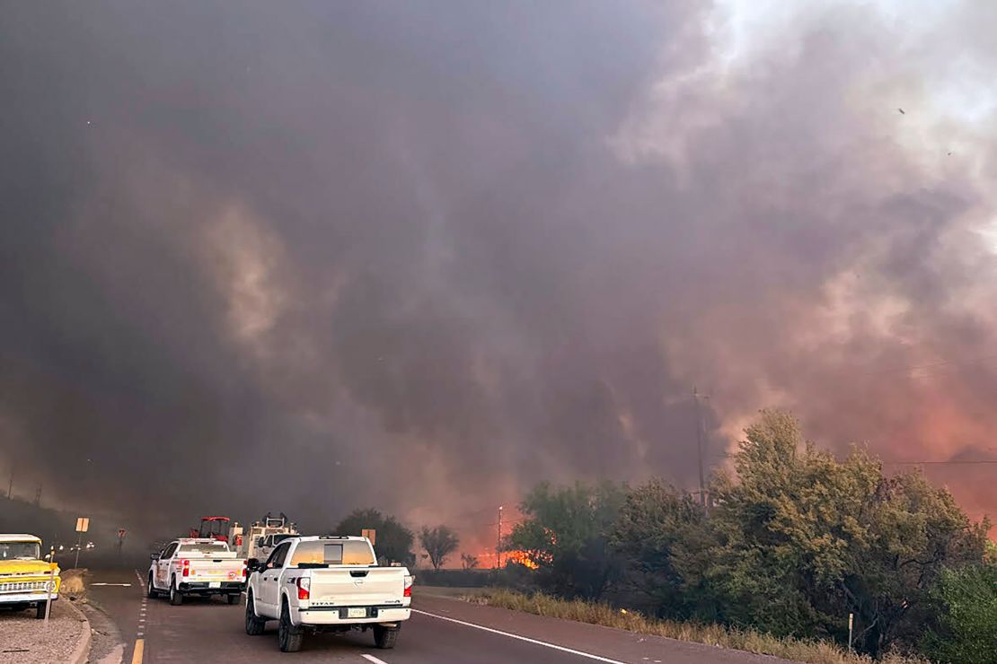 Smoke fills the sky as the Rose Fire burns southeast of Wickenburg, Arizona, Wednesday.