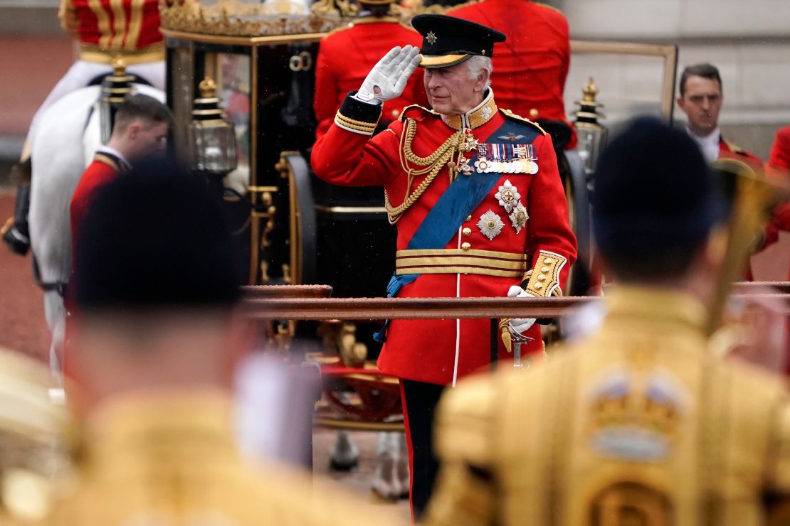 King Charles takes a salute as he attends the Trooping the Colour ceremony.