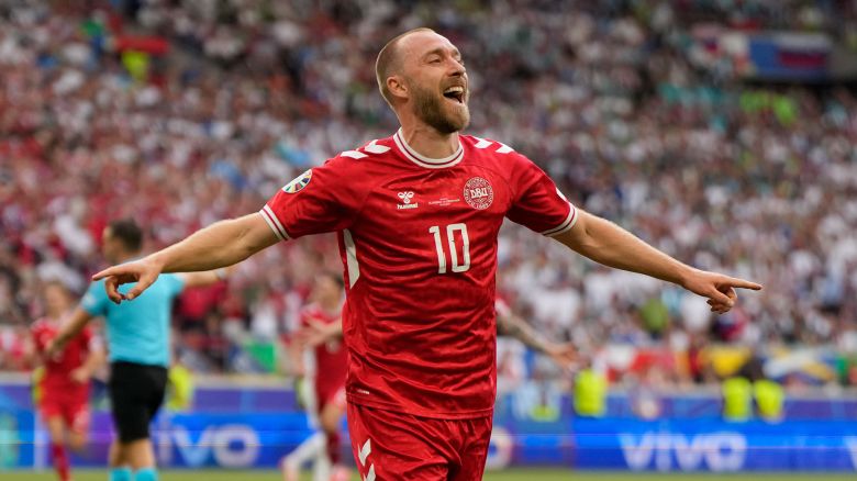 Denmark's Christian Eriksen celebrates after scoring the opening goal of the game during a Group C match between Slovenia and Denmark at the Euro 2024 soccer tournament in Stuttgart, Germany, Sunday, June 16, 2024.