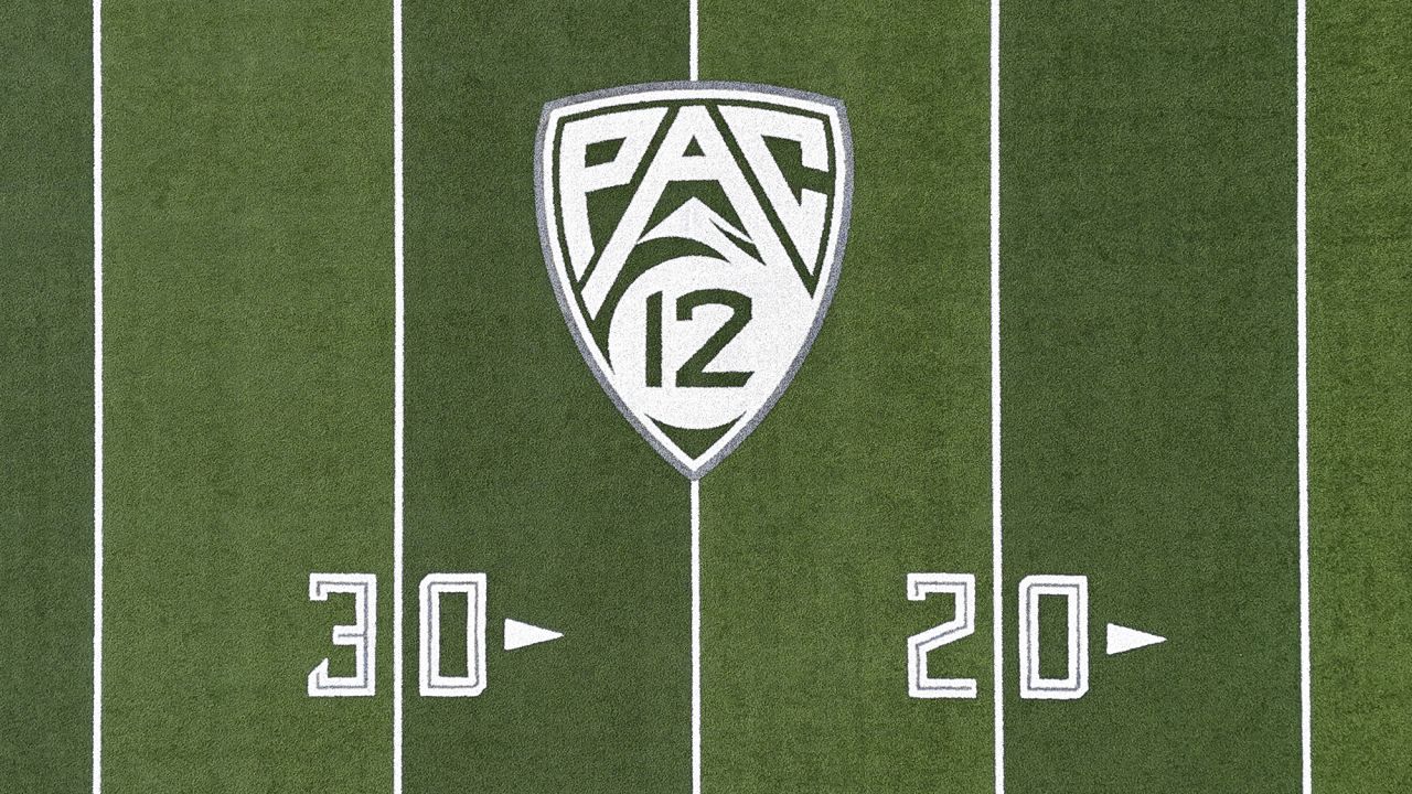 The Pac-12 Conference logo on the Autzen Stadium football field at the University of Oregon.