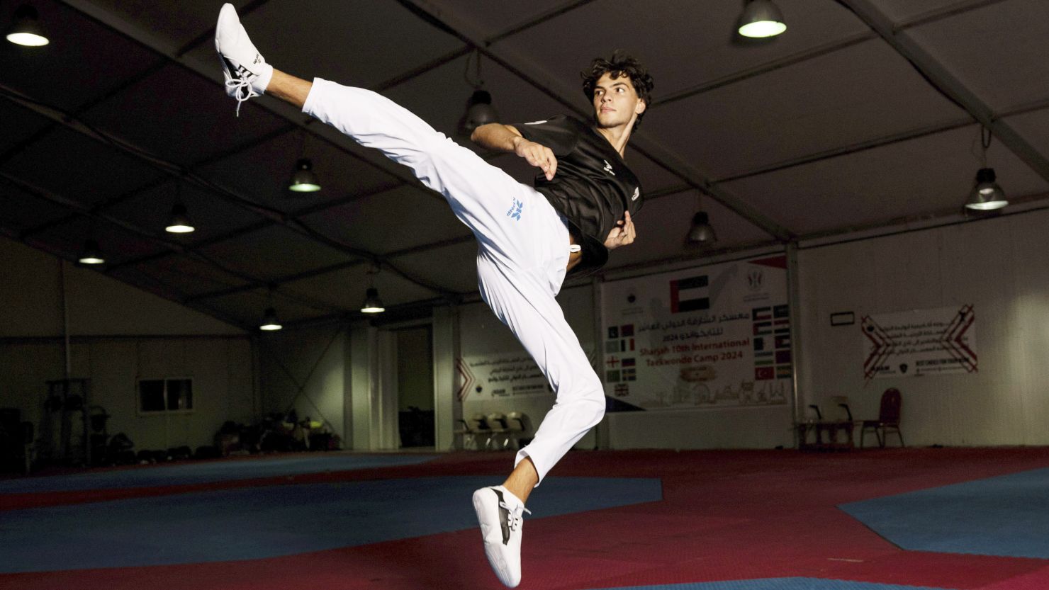 Omar Ismail, who was born in Dubai and will be competing for the Palestinian territories at the Paris Olympics, practices taekwondo in Sharjah, United Arab Emirates, on June 20.