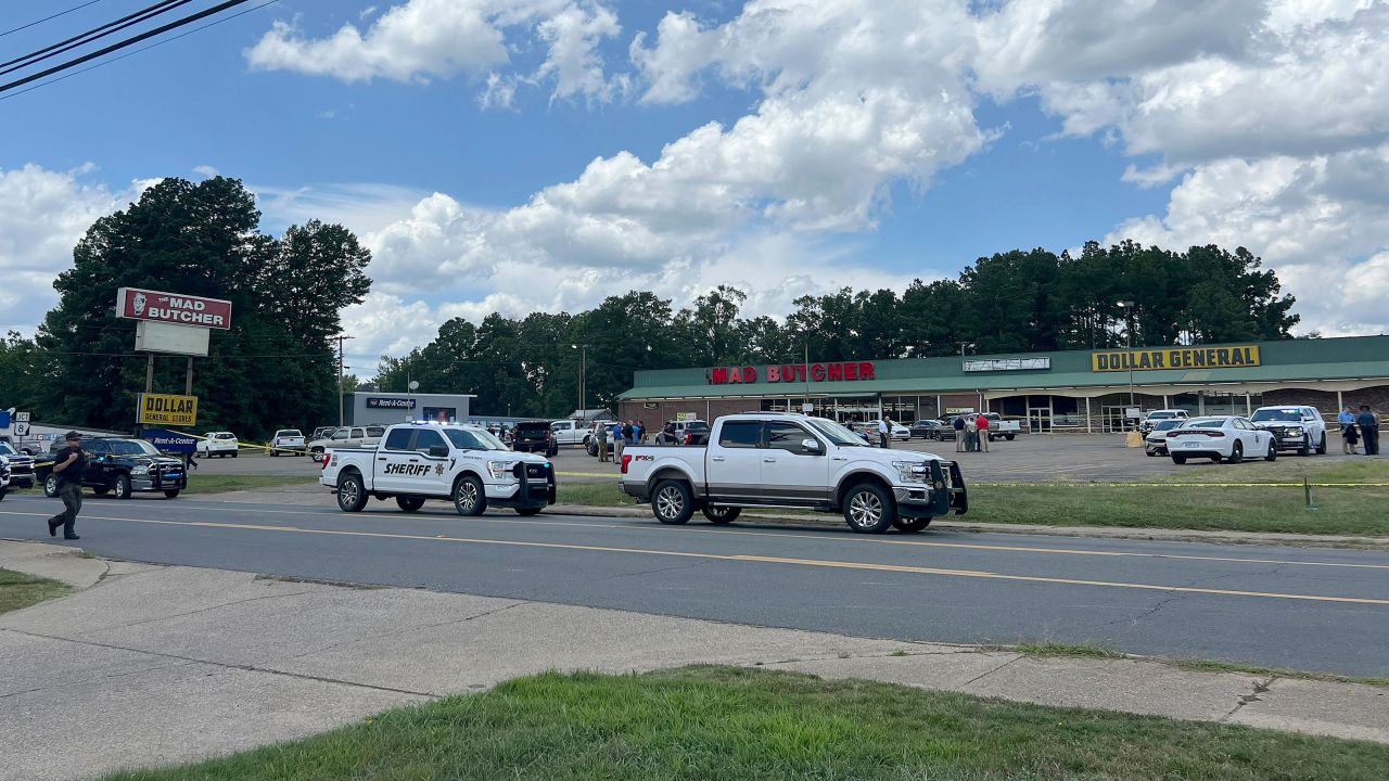 Police vehicles remain on the scene of a shooting at the Mad Butcher grocery store, Friday, June 21, 2024, Frodyce, Ark.