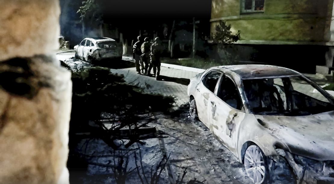 In this photo taken from video released by the National Antiterrorism Committee on Monday, June 24, 2024, FSB officers conduct a counter-terrorist operation in republic of Dagestan, Russia.