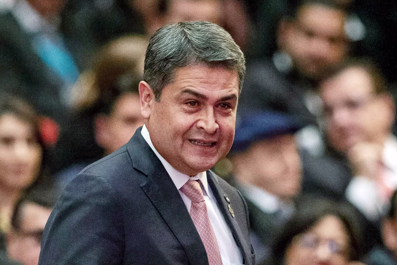Juan Orlando Hernandez arrives for the swearing-in ceremony for Guatemala's new president, in Guatemala City, in January 2020.