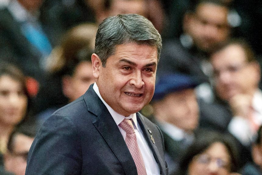 Juan Orlando Hernandez arrives at the swearing-in ceremony of Guatemala's new president in Guatemala City on January 14, 2020.