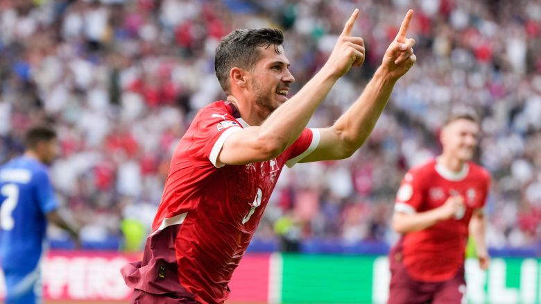 Switzerland's Remo Freuler celebrates after scoring during a round of sixteen match between Switzerland and Italy at the Euro 2024 soccer tournament in Berlin, Germany, Saturday, June 29, 2024.