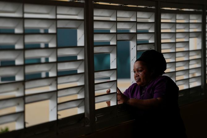 Donna Charles, a hotel cook, watches as Hurricane Beryl passes through Bridgetown, Barbados, on July 1.