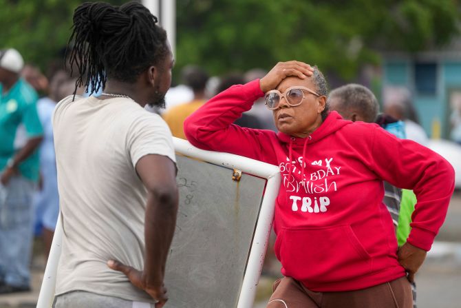 Sylvia Small waits to enter the Bridgetown Fisheries pier so she could check her boat's damage in Barbados on July 1.