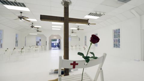 FILE - In this Nov. 12, 2017, file photo, a rose rests on a chair during a memorial for the victims of the shooting at Sutherland Springs First Baptist Church at the church in Sutherland Springs, Texas.  (AP Photo/Eric Gay, File)