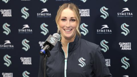 Seattle Kraken new assistant coach Jessica Campbell speaks during an NHL hockey press conference Wednesday, July 3, 2024, in Seattle. Campbell will become the first woman to work on the bench of an NHL franchise after the team hired her as an assistant coach. (AP Photo/Jason Redmond)