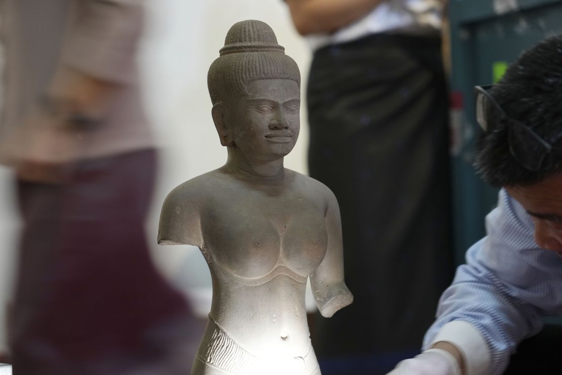 Fourteen rare Angkor era sculptures tied to a controversial art dealer and collector were returned to Cambodia from New York's Metropolitan Museum of Art earlier this week.