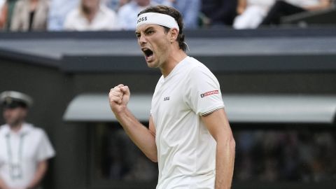 Taylor Fritz of the United States reacts during his fourth round match against Alexander Zverev of Germany at the Wimbledon tennis championships in London, Monday, July 8, 2024. (AP Photo/Kirsty Wigglesworth)