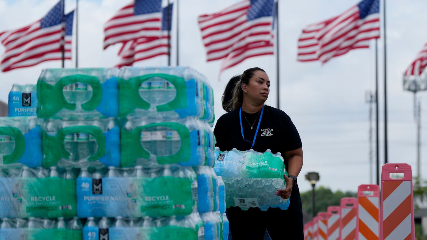 Staff at Lakewood Church hand out water and operate a cooling station in Houston, on July 9.