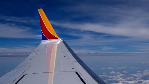 A Southwest Airlines Boeing 737 Max 8 passenger jet flies over the central United States heading for Chicago from Tulsa, Okla., June 15, 2024, in Tulsa.