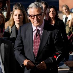 Actor Alec Baldwin arrives for his hearing in Santa Fe County District Court with attorney Luke Nikas, left, Wednesday, July 10, 2024, in Santa Fe, N.M. Baldwin is facing a single charge of involuntary manslaughter in the death of a cinematographer.