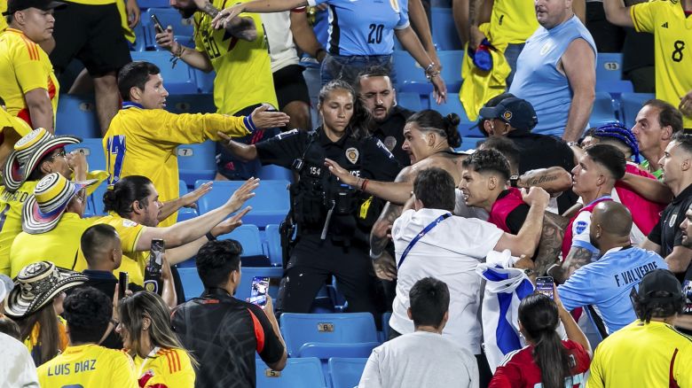 CHARLOTTE, NC - JULY 10: Uruguay forward Darwin Núñez (19) engages with hostile fans in the stands after the CONMEBOL Copa America semifinal between Uruguay and Colombia on Wednesday July 10, 2024 at Bank of America Stadium in Charlotte, NC. (Photo by Nick Tre. Smith/Icon Sportswire) (Icon Sportswire via AP Images)