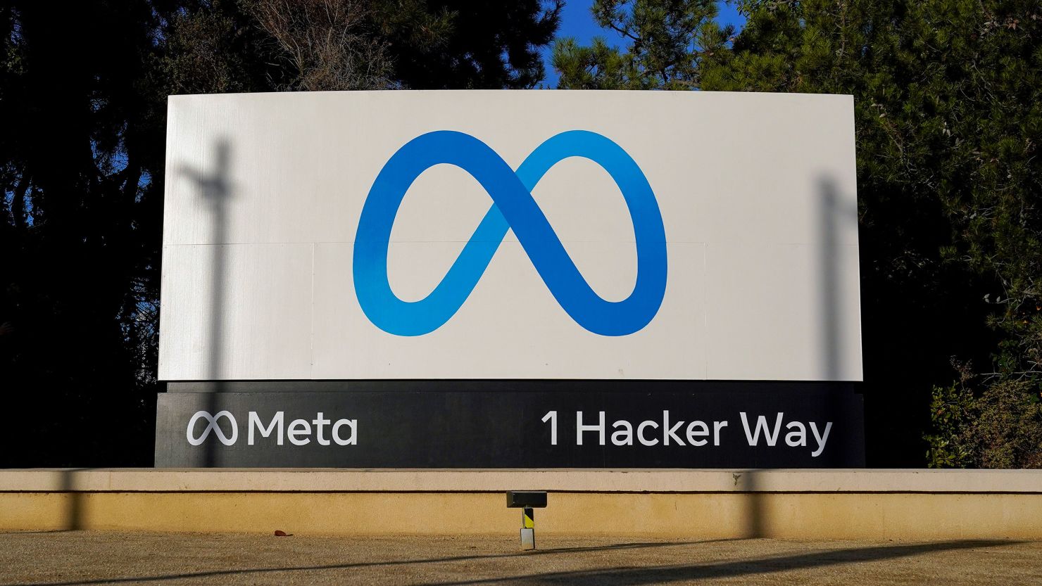 Meta's logo is seen on a sign at the company's headquarters in Menlo Park, Calif., Nov. 9, 2022.