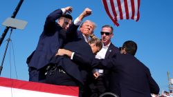 Republican presidential candidate former President Donald Trump is surrounded by U.S. Secret Service agents at a campaign rally, Saturday, July 13, 2024, in Butler, Pa. (AP Photo/Evan Vucci)