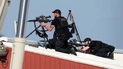 Police snipers return fire after shots were fired while Republican presidential candidate former President Donald Trump was speaking at a campaign event in Butler, Pa., on Saturday, July 13, 2024. (AP Photo/Gene J. Puskar)