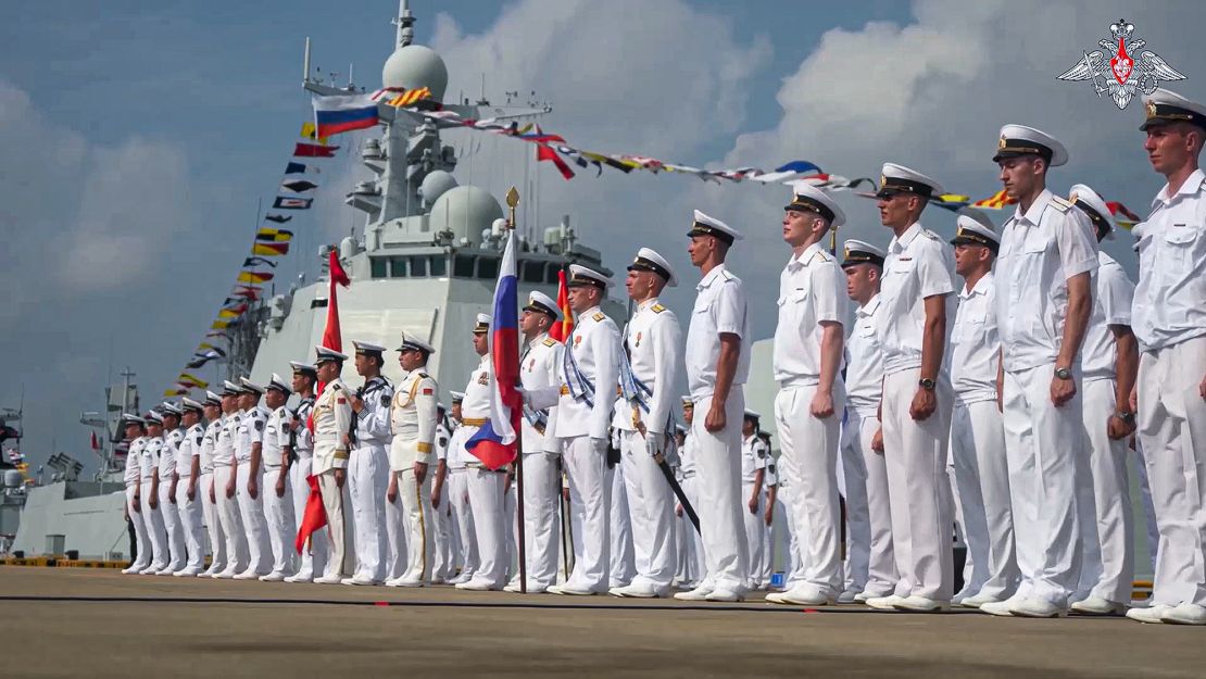 Russian military sailors attend the opening ceremony for a joint naval exercise in the South China Sea in July.