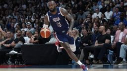 Team USA's LeBron James drives against Australia during the USA Basketball Showcase in Abu Dhabi, United Arab Emirates, Monday, July 15, 2024. (AP Photo/Altaf Qadri)