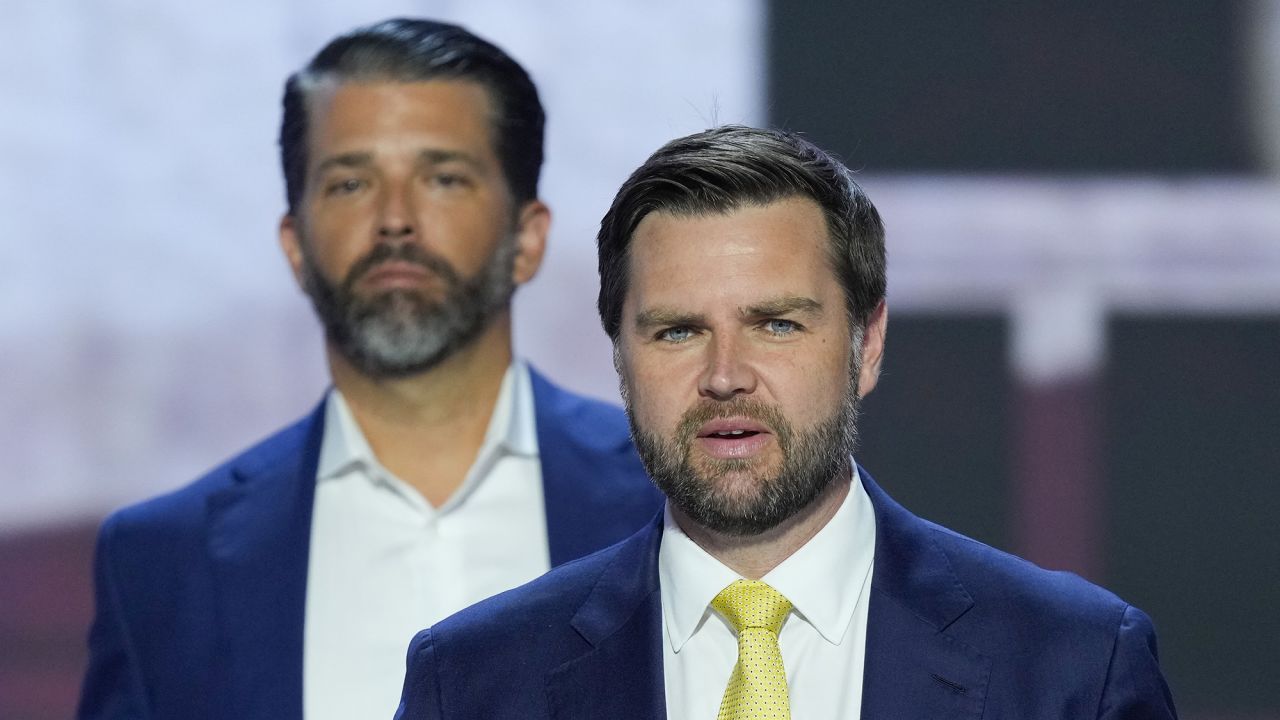 Republican vice presidential candidate Sen. JD Vance, R-Ohio, on stage during the walkthrough for the Republican National Convention Tuesday, July 16, 2024, in Milwaukee. Standing behind him is Donald Trump Jr.