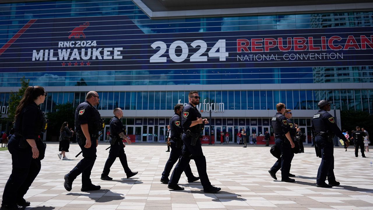 Law enforcement officers walk around the Fiserv Forum before the Republican National Convention Wednesday, July 17, 2024, in Milwaukee.