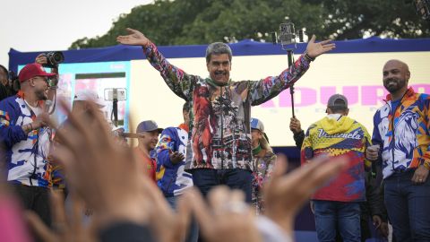 Venezuelan President Nicolas Maduro gestures to supporters during a campaign rally in the Catia neighborhood of Caracas, Venezuela, Thursday, July 18, 2024. Venezuela is set to hold presidential elections July 28. (AP Photo/Matias Delacroix)