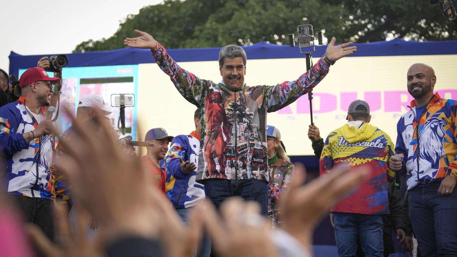 Venezuelan President Nicolas Maduro gestures to supporters during a campaign rally in the Catia neighborhood of Caracas, July 18, 2024.