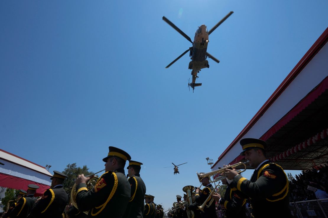 Turkish military helicopters fly over the military parade in the Turkish-occupied area of Nicosia on Saturday.