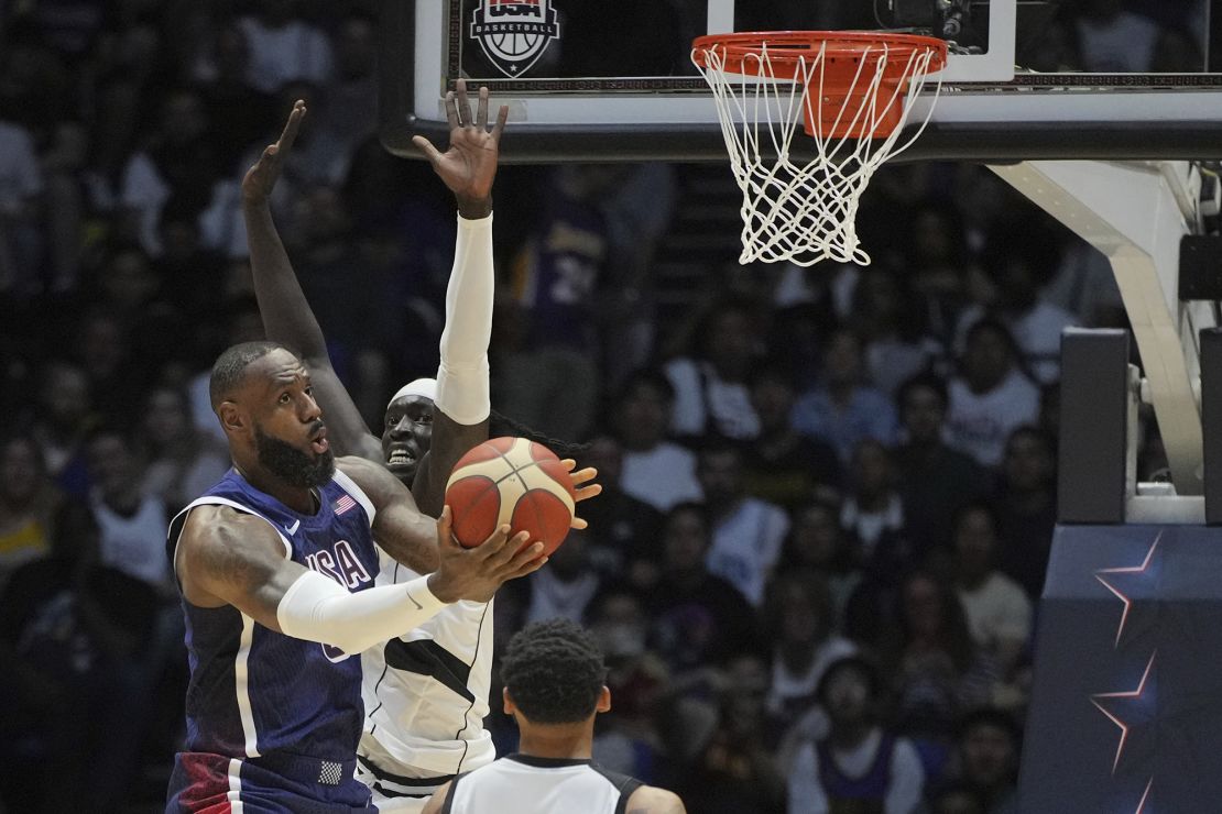 Gabriel attempts to block a shot against Los Angeles Lakers superstar LeBron James.