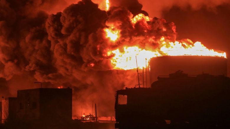 Oil tanks burn at the port in Hodeidah, Yemen, Saturday, July 20, 2024. The Israeli army said it has struck several Houthi targets in western Yemen following a fatal drone attack by the rebel group in Tel Aviv the previous day. (AP Photo)