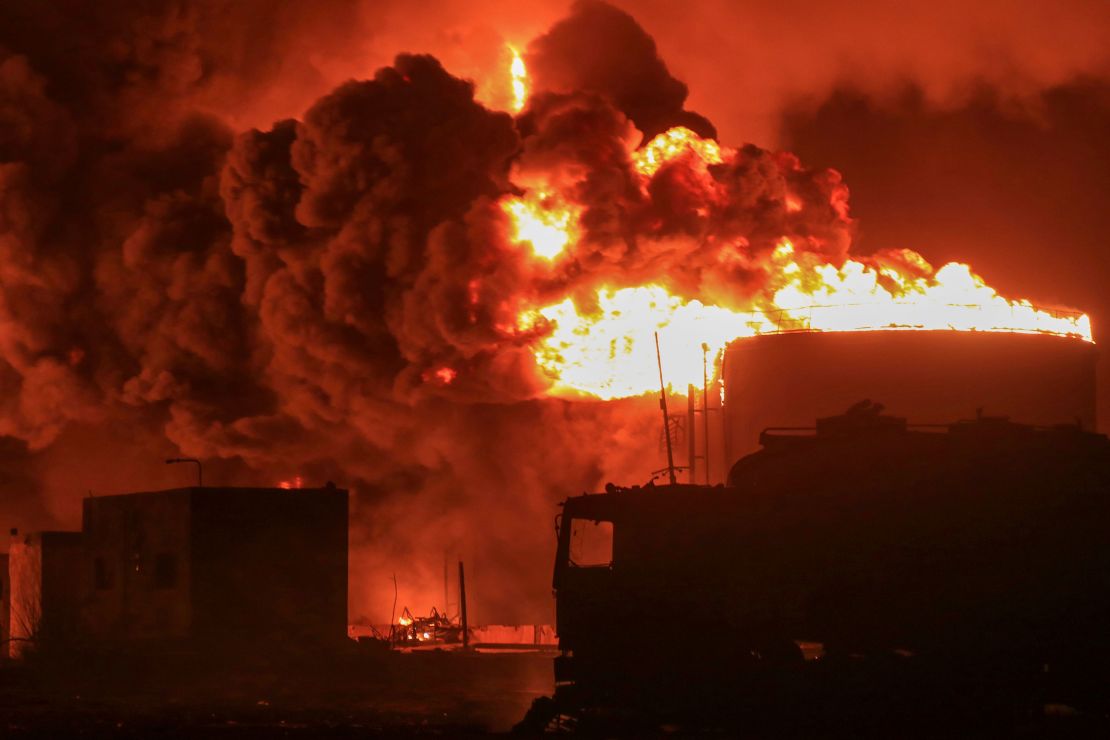 Oil tanks burn in the port of Hodeidah, Yemen, on Saturday, July 20, 2024, following an Israeli attack.