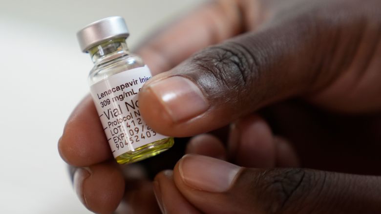 A pharmacist holds a vial of lenacapavir, at the Desmond Tutu Health Foundation's Masiphumelele Research Site, in Cape Town, South Africa, Tuesday, July 23, 2024. (AP Photo/Nardus Engelbrecht)