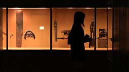 A person walks through the Margaret Mead Hall of Pacific Peoples in the American Museum of Natural History in New York, Thursday, July 18, 2024. (AP Photo/Pamela Smith)