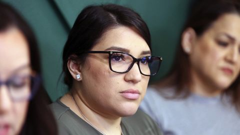 FILE - Lizelle Gonzalez, center, listens as a statement is read aloud by her lawyer Cecilia Garza, left, during a press conference held in Garza's office Tuesday, April 2, 2024, in Edinburg, Texas. A federal judge on Wednesday, July 24, 2024, allowed Gonzalez’s lawsuit to proceed after prosecutors and a sheriff arrested and indicted her on murder charges in 2022 for self-managing an abortion before the case was later dropped. (Joel Martinez/The Monitor via AP, File)/The Monitor via AP, File)