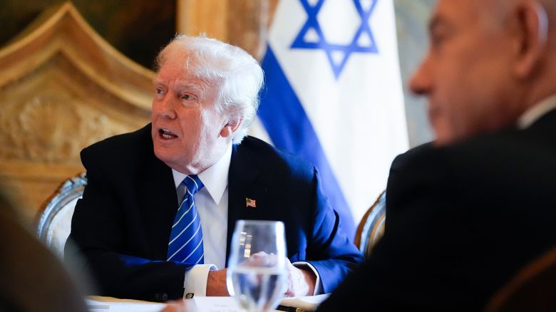 Former President Donald Trump meets with Israeli Prime Minister Benjamin Netanyahu at his Mar-a-Lago estate on Friday in Palm Beach, Florida.