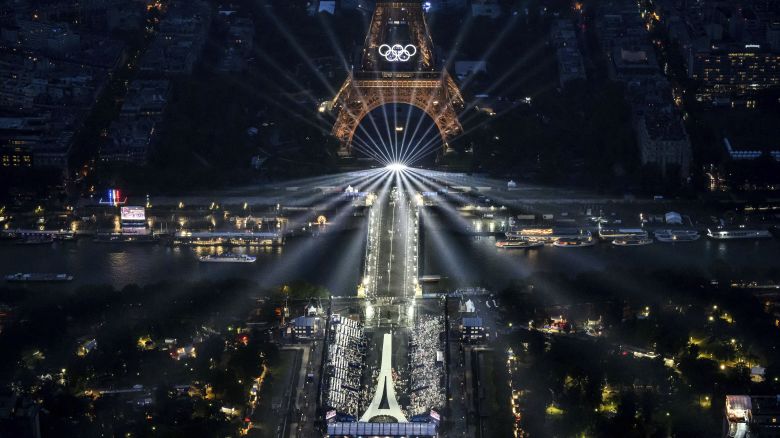 The Eiffel Tower and the Olympics rings are lit up during the opening ceremony for the 2024 Summer Olympics in Paris, France, Friday, July 26, 2024.