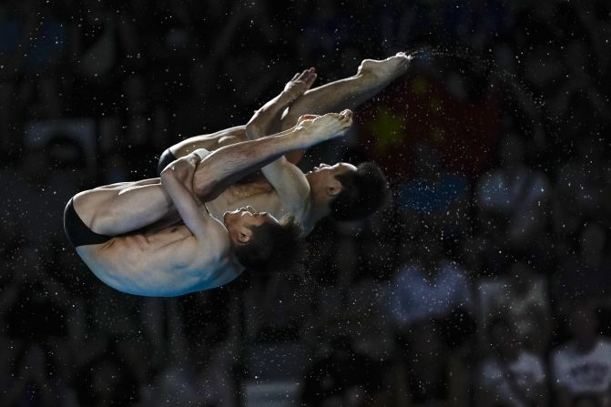 Chinese divers Lian Junjie and Yang Hao compete in the synchronized 10-meter platform event on July 29. The duo <a >recorded the highest score</a> in every round to win the gold medal.