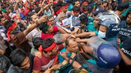 Activists clash with the police as they stage a song march to remember victims of the recent countrywide deadly clashes, in Dhaka, Bangladesh, on July 30, 2024.