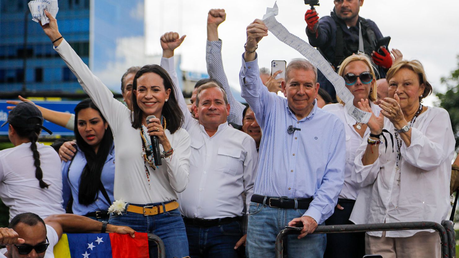 Opposition leader Maria Corina Machado, left, and opposition candidate Edmundo Gonzalez hold up vote tally sheets from the top of a truck during a protest in Caracas, Venezuela, on Tuesday, July 30, 2024, two days after the election.