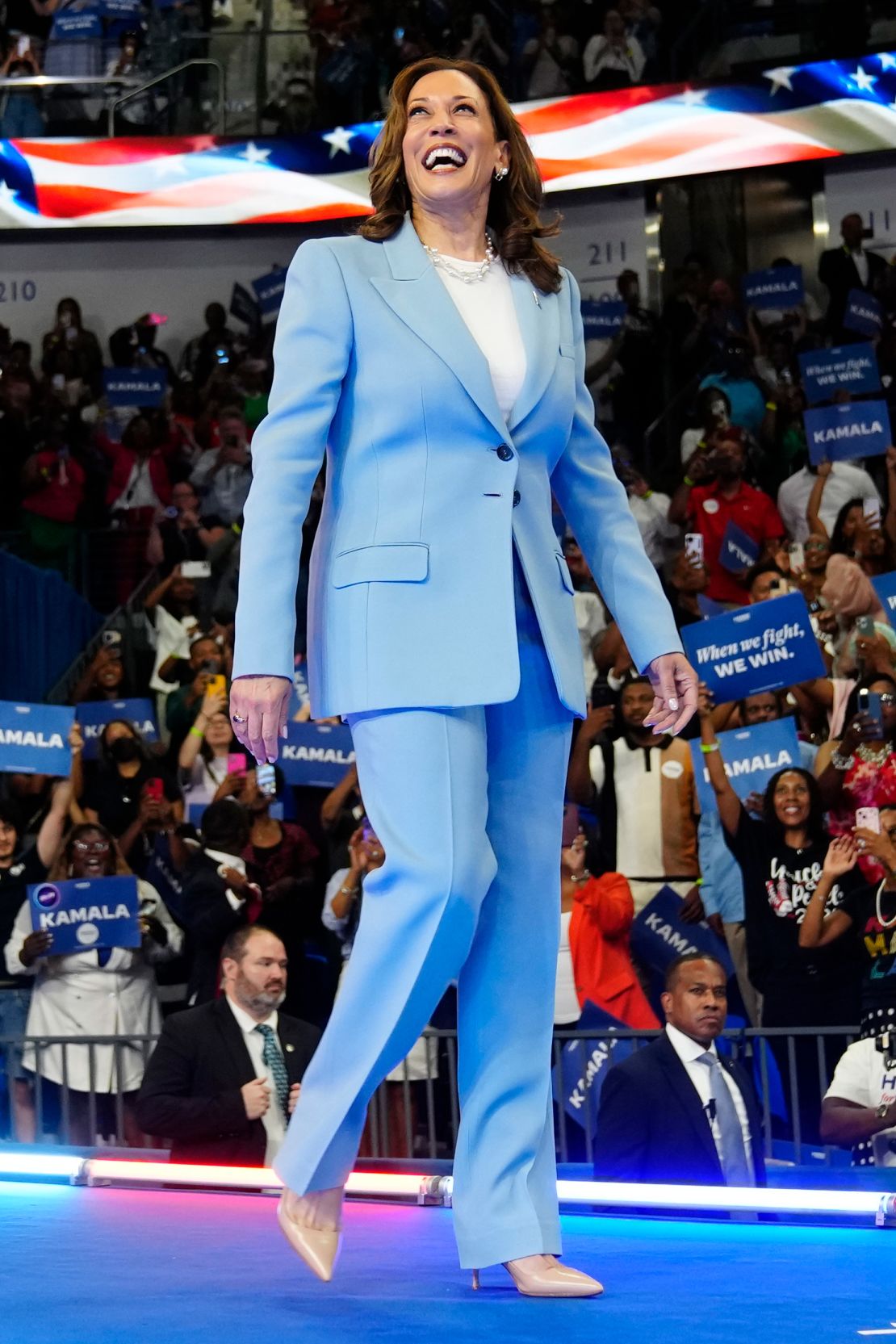 Kamala Harris' icy blue suit seemed twinned in a way with Megan's cropped version.