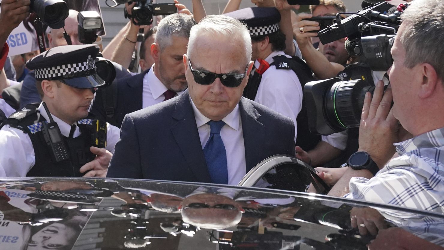 Former BBC broadcaster Huw Edwards leaves Westminster Magistrates' Court in London, where he pleaded guilty to three counts of "making<strong><em> </em></strong>indecent images of children."