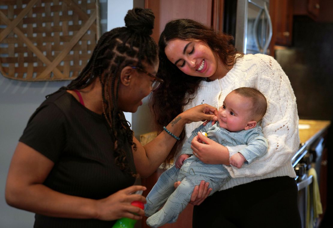 Jasmine Heriot, right, a former Mary's Shelter resident, talks to the child of Meryem Bakache, a mother at Mary's Shelter maternity home in Fredericksburg, Virginia, on Friday, January 5, 2024. Today there are more than 450 maternity homes in the U.S., many of them faith-based. Anti-abortion advocates see them as the next step in preventing abortions and providing long-term support for low-income pregnant women and mothers.