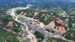 In this photo released by Xinhua News Agency, an aerial drone shows flood damaged areas of Bamianshan Yao Township, Zixing City, southeastern China's Hunan Province on July 30, 2024. Some have died and others are missing in the city in southeastern China after days of heavy rains tied to a tropical storm, state media said Thursday. (Chen Zhenhai/Xinhua via AP)