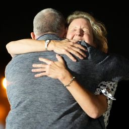 Elizabeth Whelan, right, hugs her brother Paul Whelan at Andrews Air Force Base, Md., following his release as part of a 24-person prisoner swap between Russia and the United States, Thursday, August 1, 2024.