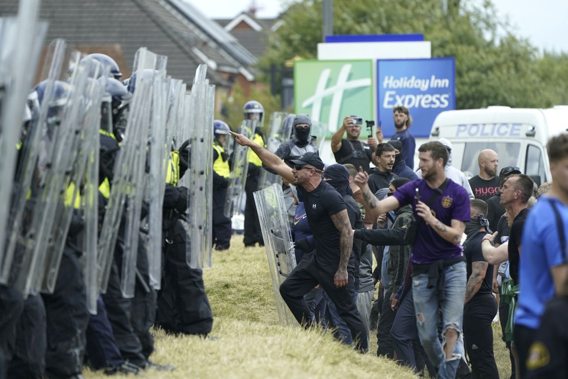 Rioters clash with police outside the Holiday Inn Express in Rotherham, South Yorkshire, August 4, 2024.