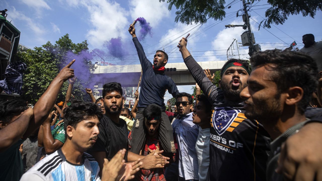 Protesters shout slogans as they celebrate after getting the news of Prime Minister Sheikh Hasina's resignation, in Dhaka, Bangladesh, Monday, Aug. 5, 2024. (AP Photo/Rajib Dhar)