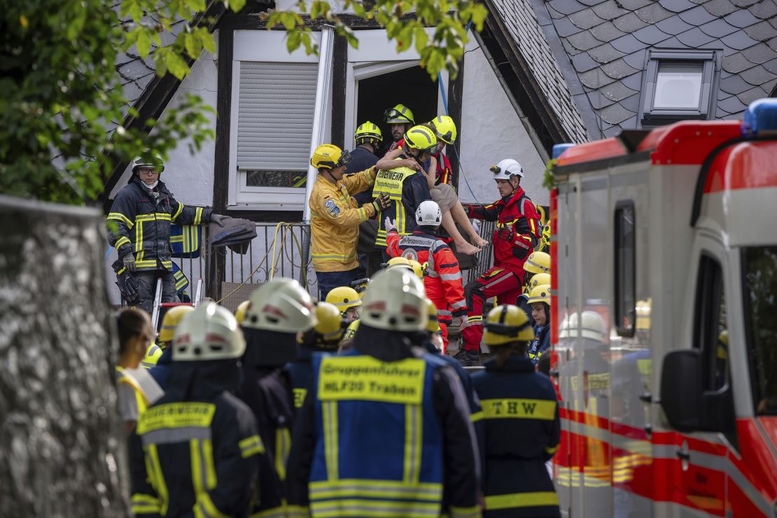 A person is rescued from the partially collapsed hotel in Kröv, Germany, on Wednesday.