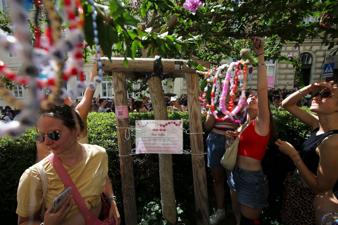 Swifties placed bracelets on a tree in downtown Vienna in August after their favorite artist's concerts were canceled.